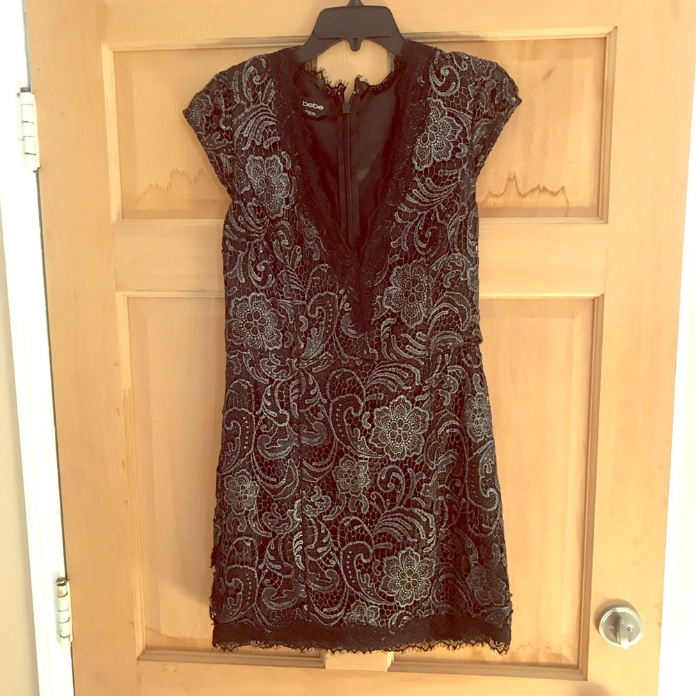 Classy black Bebe dress with cap sleeves